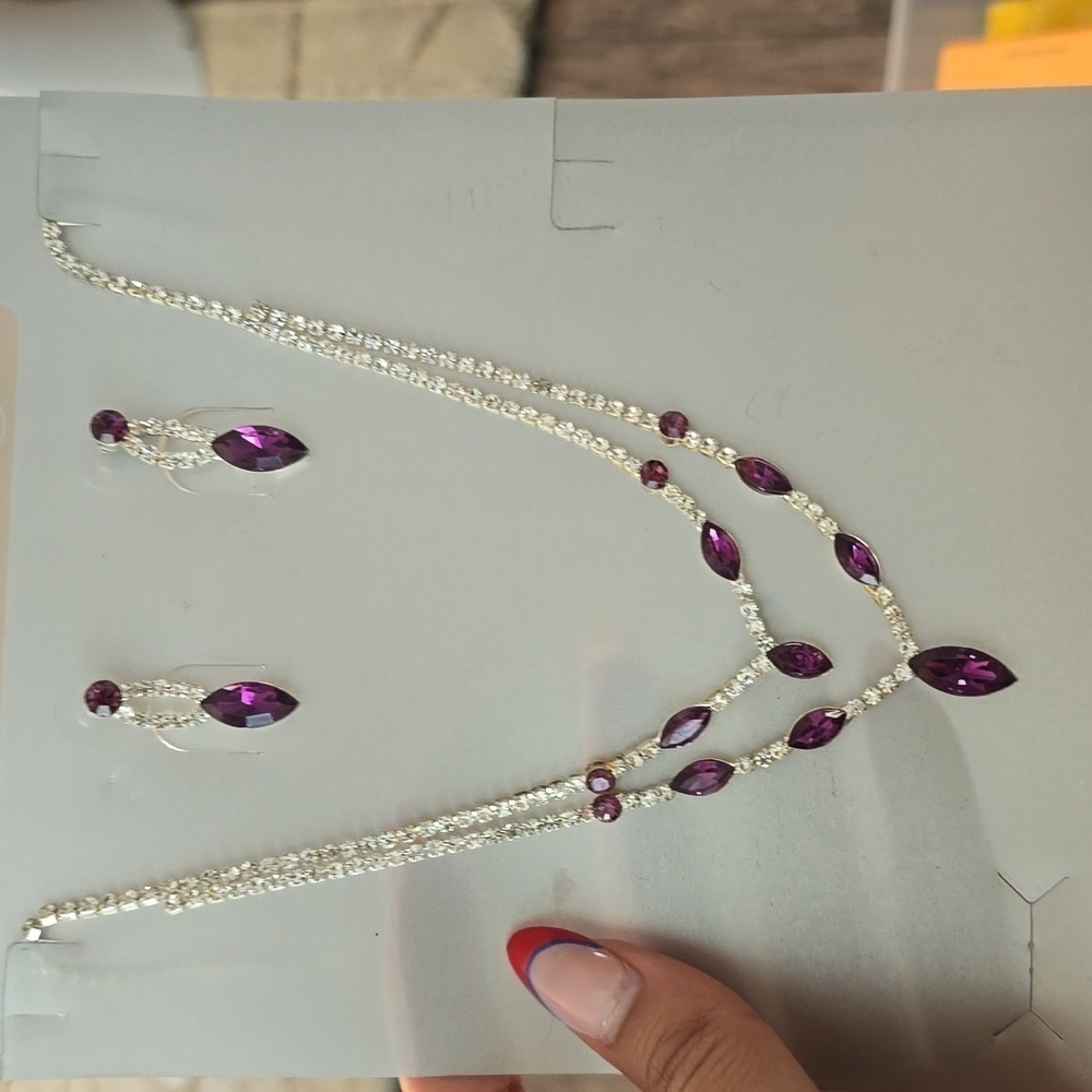 Women's silver and purple necklace set with earrings
